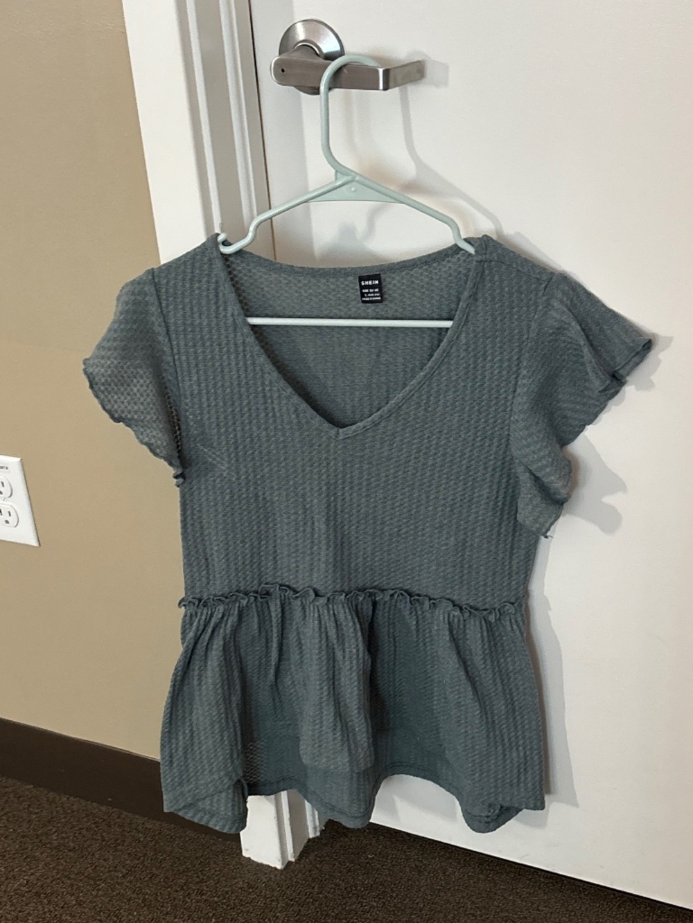 Women’s babydoll v neck top in teal blue